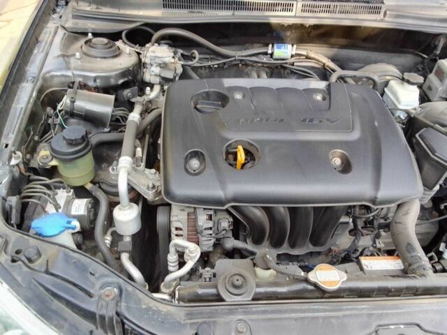 Черный Киа Черато, объемом двигателя 1.6 л и пробегом 213 тыс. км за 5000 $, фото 6 на Automoto.ua