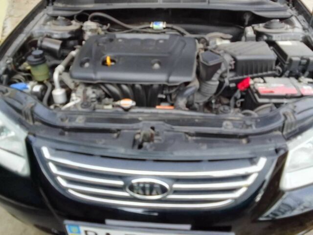 Черный Киа Черато, объемом двигателя 1.6 л и пробегом 213 тыс. км за 5000 $, фото 1 на Automoto.ua