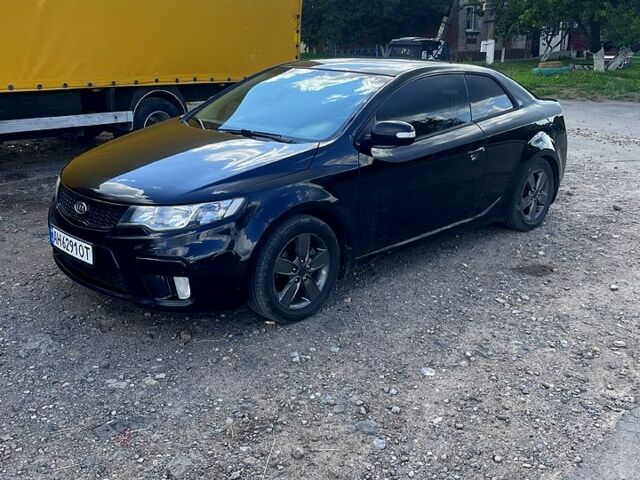 Черный Киа Черато, объемом двигателя 1.6 л и пробегом 243 тыс. км за 7200 $, фото 3 на Automoto.ua