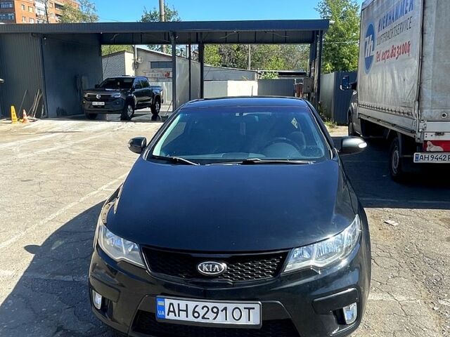 Черный Киа Черато, объемом двигателя 1.6 л и пробегом 243 тыс. км за 7200 $, фото 2 на Automoto.ua