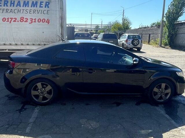 Черный Киа Черато, объемом двигателя 1.6 л и пробегом 243 тыс. км за 7200 $, фото 1 на Automoto.ua