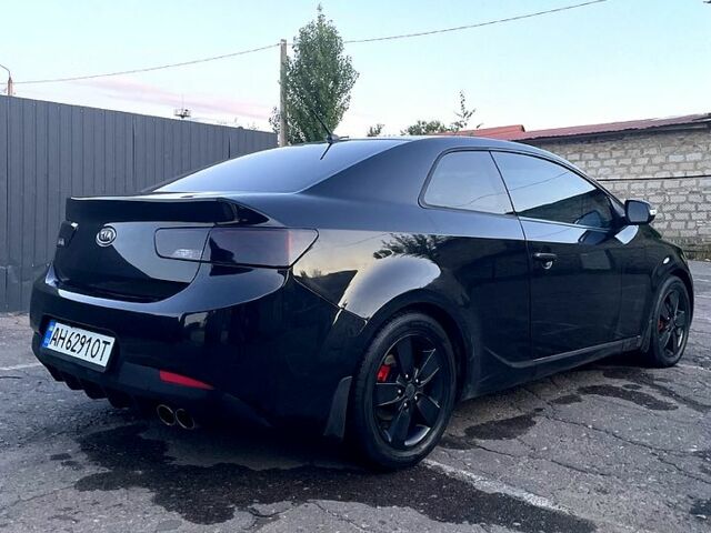 Черный Киа Черато, объемом двигателя 1.6 л и пробегом 243 тыс. км за 7200 $, фото 4 на Automoto.ua
