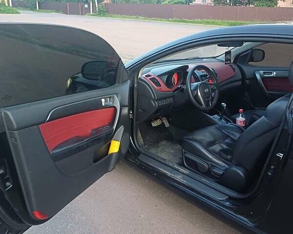 Чорний Кіа Черато, об'ємом двигуна 2 л та пробігом 261 тис. км за 7399 $, фото 4 на Automoto.ua