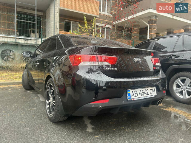 Чорний Кіа Черато, об'ємом двигуна 2 л та пробігом 209 тис. км за 8000 $, фото 9 на Automoto.ua