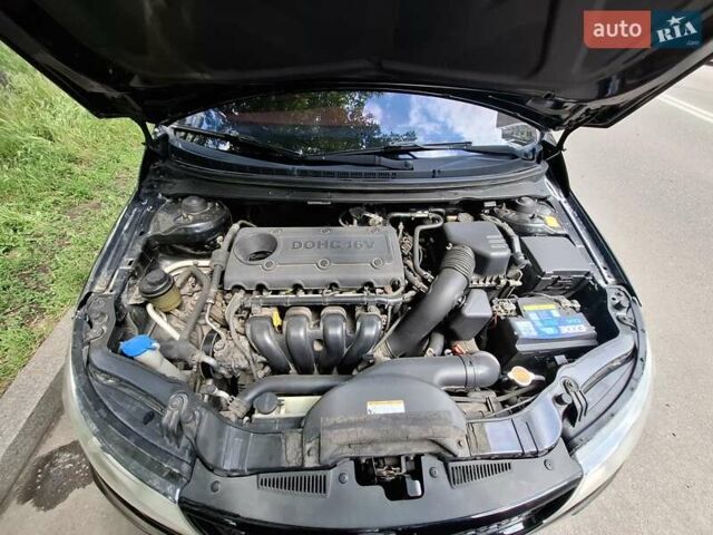 Черный Киа Черато, объемом двигателя 2 л и пробегом 188 тыс. км за 8000 $, фото 5 на Automoto.ua