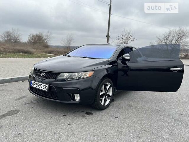 Чорний Кіа Черато, об'ємом двигуна 2 л та пробігом 53 тис. км за 8000 $, фото 11 на Automoto.ua