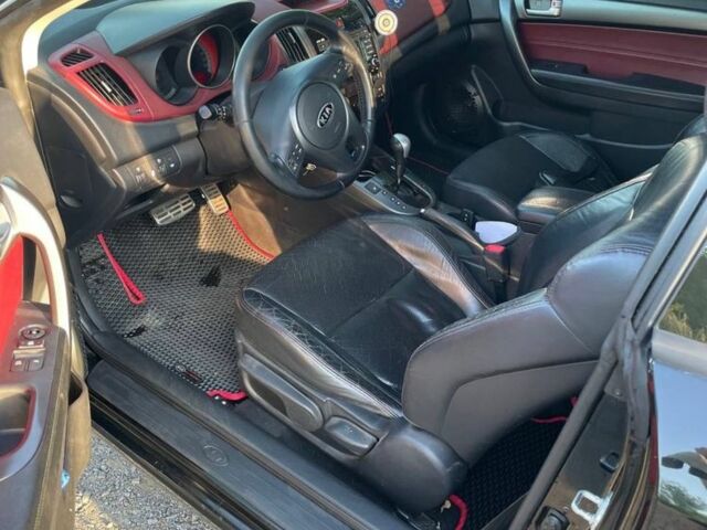 Черный Киа Черато, объемом двигателя 2 л и пробегом 238 тыс. км за 7700 $, фото 4 на Automoto.ua