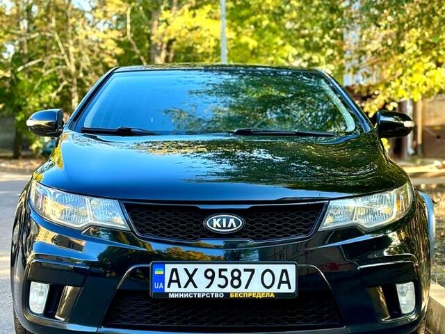 Черный Киа Черато, объемом двигателя 2 л и пробегом 151 тыс. км за 8500 $, фото 2 на Automoto.ua