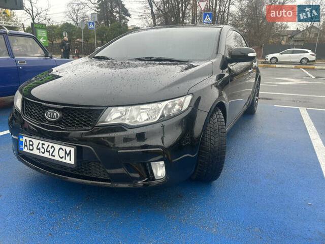 Чорний Кіа Черато, об'ємом двигуна 2 л та пробігом 209 тис. км за 8000 $, фото 1 на Automoto.ua