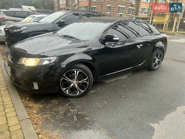 Чорний Кіа Черато, об'ємом двигуна 2 л та пробігом 209 тис. км за 8000 $, фото 10 на Automoto.ua