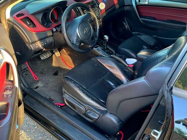 Чорний Кіа Черато, об'ємом двигуна 2 л та пробігом 238 тис. км за 7400 $, фото 5 на Automoto.ua