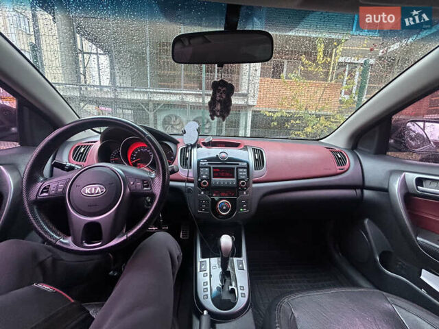 Чорний Кіа Черато, об'ємом двигуна 2 л та пробігом 209 тис. км за 8000 $, фото 3 на Automoto.ua