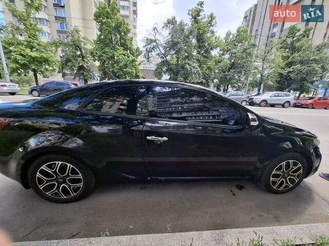 Черный Киа Черато, объемом двигателя 2 л и пробегом 188 тыс. км за 8000 $, фото 8 на Automoto.ua