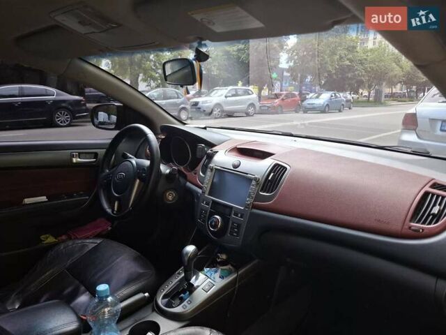 Черный Киа Черато, объемом двигателя 2 л и пробегом 188 тыс. км за 8000 $, фото 3 на Automoto.ua