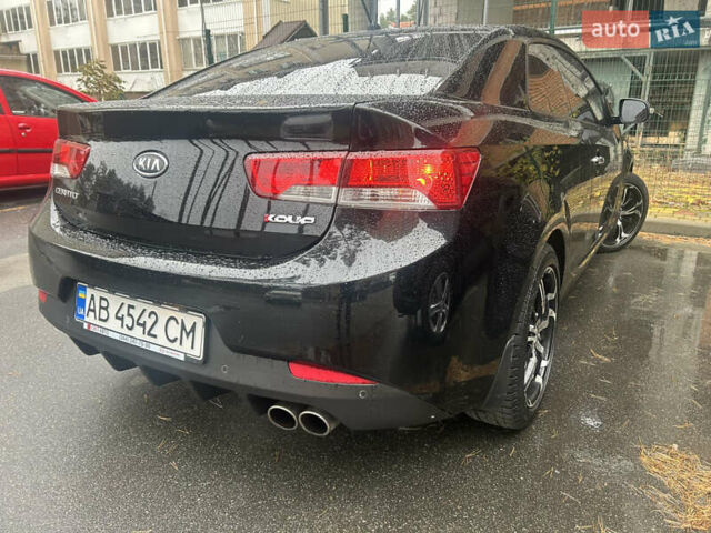 Чорний Кіа Черато, об'ємом двигуна 2 л та пробігом 209 тис. км за 8000 $, фото 7 на Automoto.ua