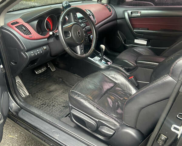 Чорний Кіа Черато, об'ємом двигуна 2 л та пробігом 209 тис. км за 8000 $, фото 5 на Automoto.ua