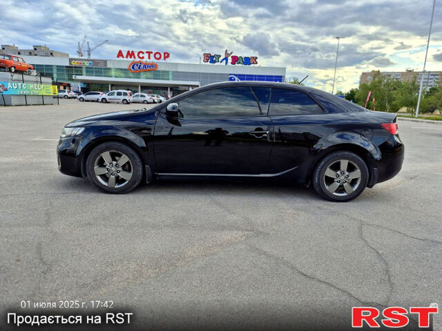 Черный Киа Черато, объемом двигателя 1.6 л и пробегом 154 тыс. км за 7400 $, фото 5 на Automoto.ua