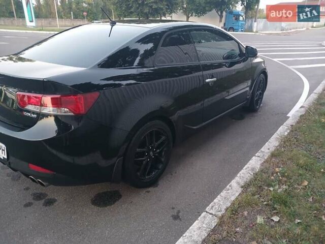 Чорний Кіа Черато, об'ємом двигуна 2 л та пробігом 178 тис. км за 8900 $, фото 8 на Automoto.ua