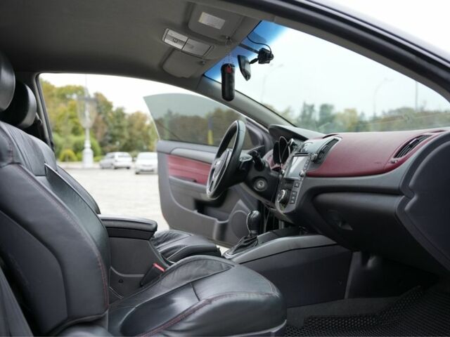 Черный Киа Черато, объемом двигателя 2 л и пробегом 198 тыс. км за 8499 $, фото 13 на Automoto.ua