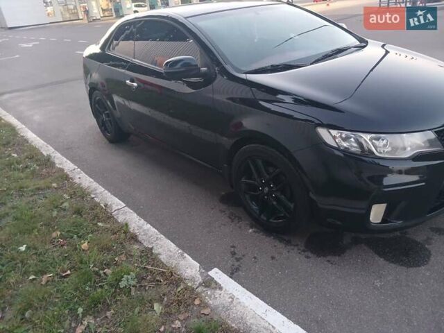 Чорний Кіа Черато, об'ємом двигуна 2 л та пробігом 178 тис. км за 8900 $, фото 6 на Automoto.ua