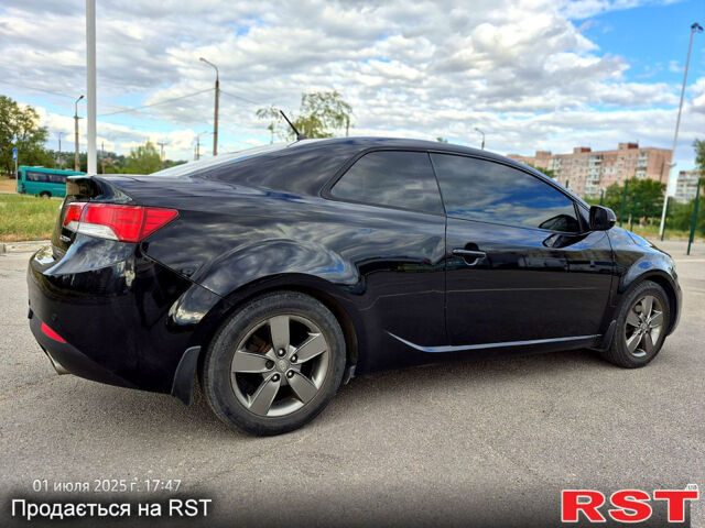 Черный Киа Черато, объемом двигателя 1.6 л и пробегом 154 тыс. км за 7400 $, фото 1 на Automoto.ua