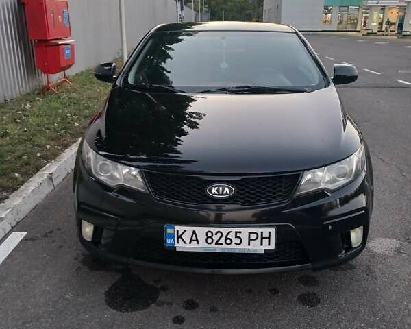 Чорний Кіа Черато, об'ємом двигуна 2 л та пробігом 178 тис. км за 8900 $, фото 7 на Automoto.ua