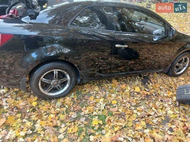 Чорний Кіа Черато, об'ємом двигуна 2 л та пробігом 178 тис. км за 8900 $, фото 10 на Automoto.ua