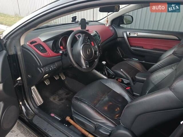 Чорний Кіа Черато, об'ємом двигуна 2 л та пробігом 178 тис. км за 8900 $, фото 3 на Automoto.ua