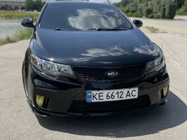 Черный Киа Черато, объемом двигателя 2.4 л и пробегом 210 тыс. км за 9500 $, фото 1 на Automoto.ua