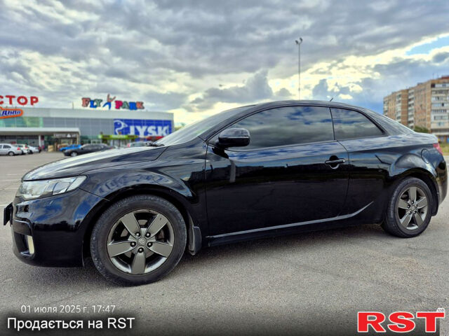 Черный Киа Черато, объемом двигателя 1.6 л и пробегом 154 тыс. км за 7400 $, фото 9 на Automoto.ua