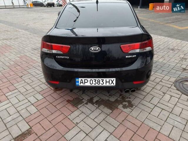 Чорний Кіа Черато, об'ємом двигуна 1.6 л та пробігом 146 тис. км за 7400 $, фото 2 на Automoto.ua