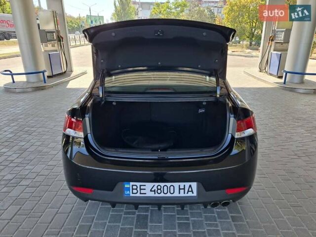 Чорний Кіа Черато, об'ємом двигуна 1.59 л та пробігом 92 тис. км за 8799 $, фото 23 на Automoto.ua