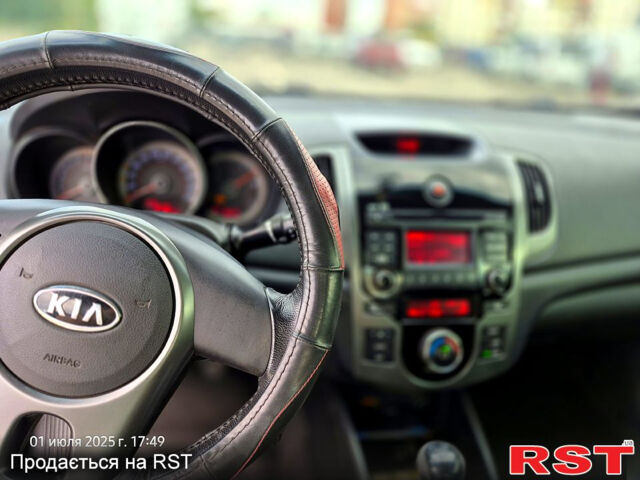 Черный Киа Черато, объемом двигателя 1.6 л и пробегом 154 тыс. км за 7400 $, фото 4 на Automoto.ua