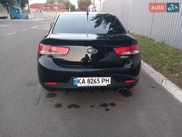Чорний Кіа Черато, об'ємом двигуна 2 л та пробігом 178 тис. км за 8900 $, фото 9 на Automoto.ua