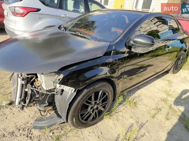 Чорний Кіа Черато, об'ємом двигуна 2 л та пробігом 252 тис. км за 5500 $, фото 1 на Automoto.ua
