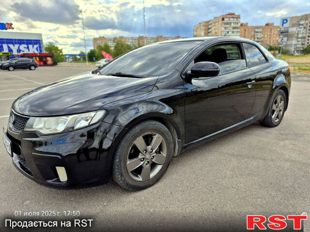 Черный Киа Черато, объемом двигателя 1.6 л и пробегом 154 тыс. км за 7400 $, фото 2 на Automoto.ua