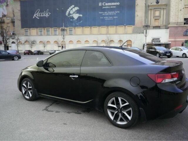 Черный Киа Черато, объемом двигателя 2 л и пробегом 198 тыс. км за 8499 $, фото 3 на Automoto.ua