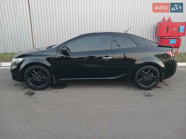 Чорний Кіа Черато, об'ємом двигуна 2 л та пробігом 178 тис. км за 8900 $, фото 2 на Automoto.ua