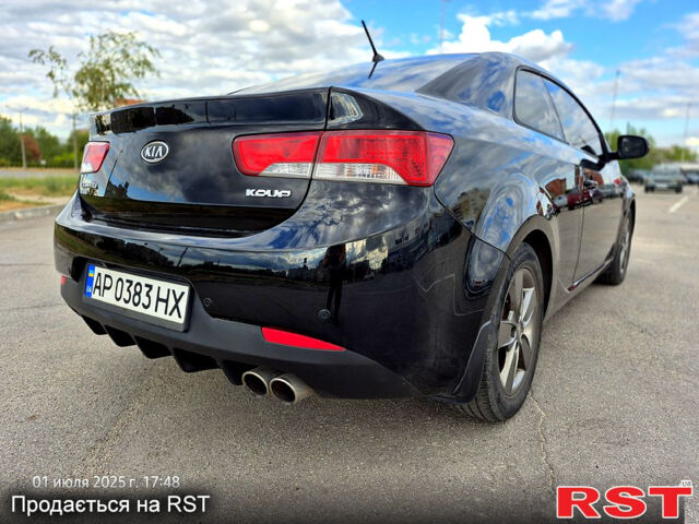 Черный Киа Черато, объемом двигателя 1.6 л и пробегом 154 тыс. км за 7400 $, фото 7 на Automoto.ua