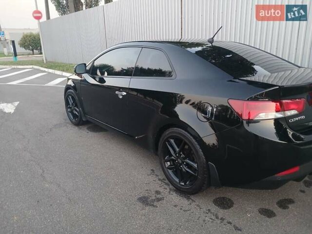 Чорний Кіа Черато, об'ємом двигуна 2 л та пробігом 178 тис. км за 8900 $, фото 4 на Automoto.ua