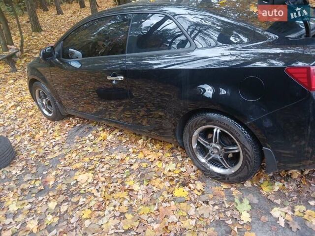 Чорний Кіа Черато, об'ємом двигуна 2 л та пробігом 178 тис. км за 8900 $, фото 11 на Automoto.ua