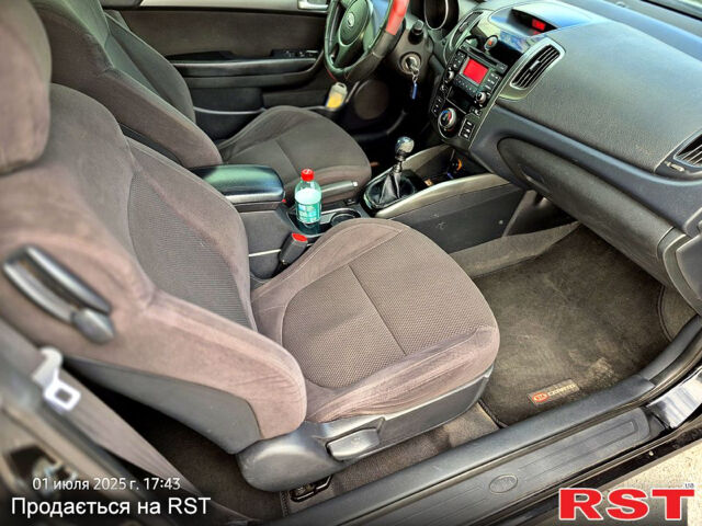 Черный Киа Черато, объемом двигателя 1.6 л и пробегом 154 тыс. км за 7400 $, фото 10 на Automoto.ua