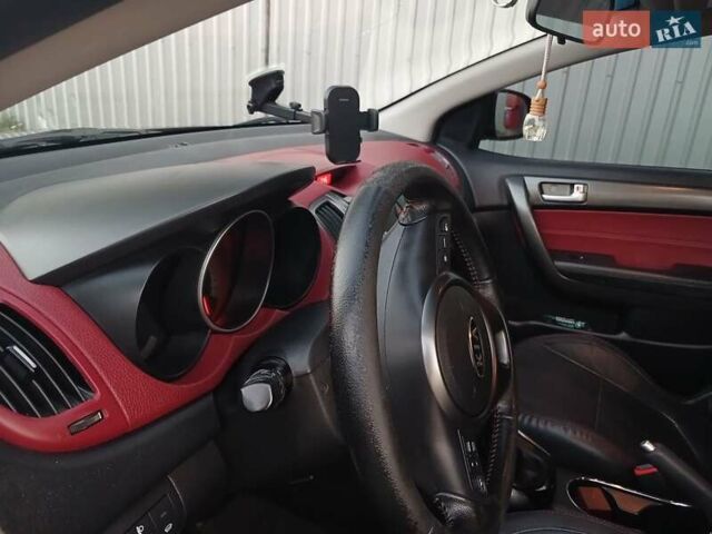 Чорний Кіа Черато, об'ємом двигуна 2 л та пробігом 178 тис. км за 8900 $, фото 1 на Automoto.ua