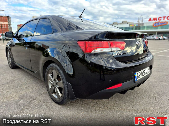 Черный Киа Черато, объемом двигателя 1.6 л и пробегом 154 тыс. км за 7400 $, фото 6 на Automoto.ua