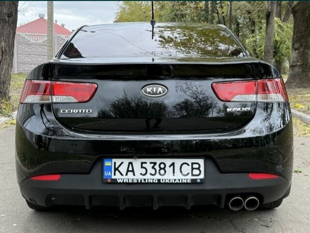 Черный Киа Черато, объемом двигателя 1.6 л и пробегом 198 тыс. км за 7500 $, фото 6 на Automoto.ua