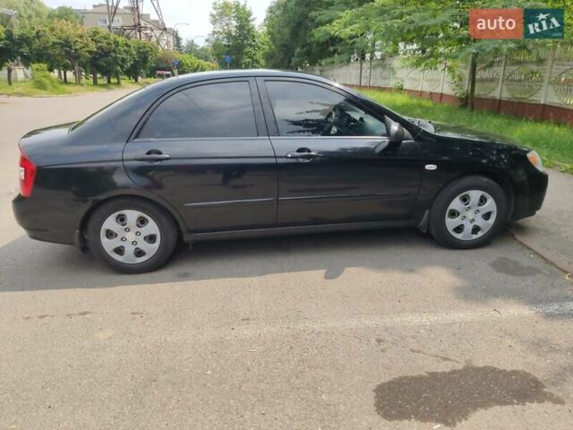 Черный Киа Черато, объемом двигателя 1.6 л и пробегом 168 тыс. км за 7000 $, фото 2 на Automoto.ua