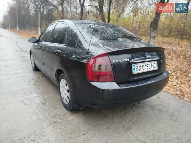 Черный Киа Черато, объемом двигателя 1.6 л и пробегом 280 тыс. км за 2999 $, фото 7 на Automoto.ua