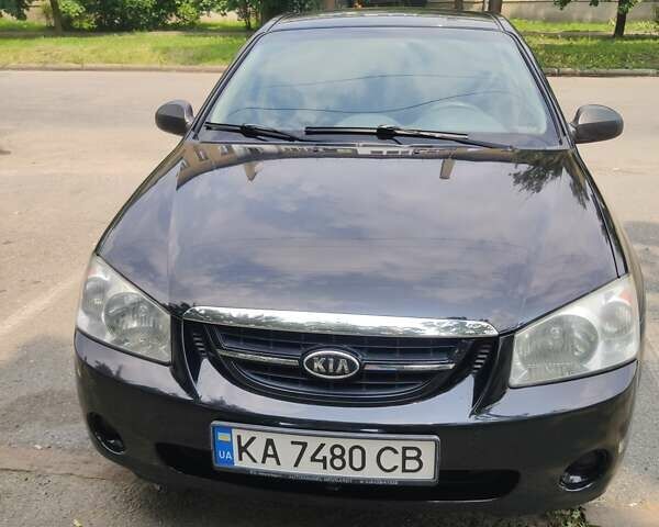 Черный Киа Черато, объемом двигателя 1.6 л и пробегом 168 тыс. км за 7000 $, фото 1 на Automoto.ua