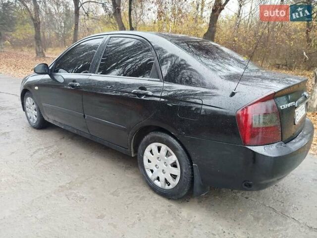 Черный Киа Черато, объемом двигателя 1.6 л и пробегом 280 тыс. км за 2999 $, фото 6 на Automoto.ua