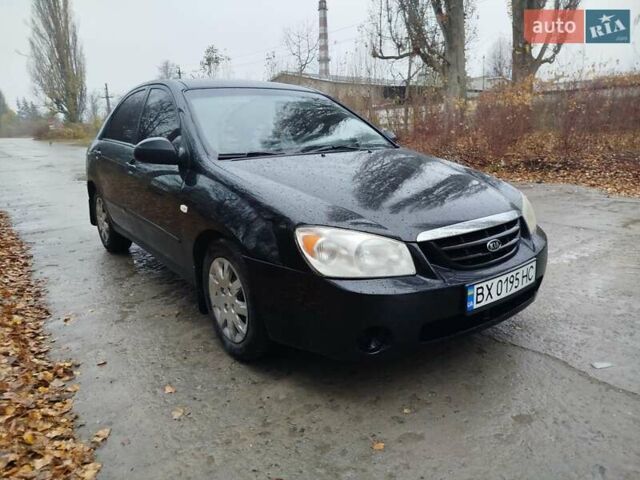 Черный Киа Черато, объемом двигателя 1.6 л и пробегом 280 тыс. км за 2999 $, фото 3 на Automoto.ua